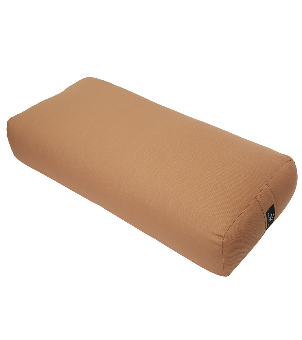 Everyday Yoga Hazelnut Yoga Bolster is designed for optimal support during yoga practice. The rectangular bolster in a warm hazelnut color provides comfort and stability for various yoga poses.