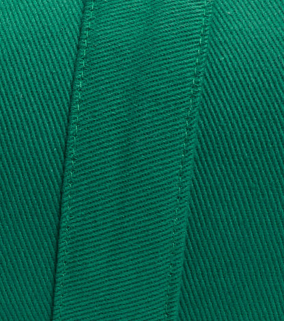 Everyday Yoga Kale Yoga Bolster in close-up, showcasing the detailed texture and stitching of the green fabric. This bolster is designed for yoga practice, providing support and comfort.