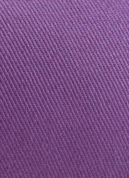 Close-up texture of a plum-colored yoga bolster fabric by Everyday Yoga. Ideal for yoga practice, this bolster is part of the Yoga Bolsters & Props collection, offering comfort and support.