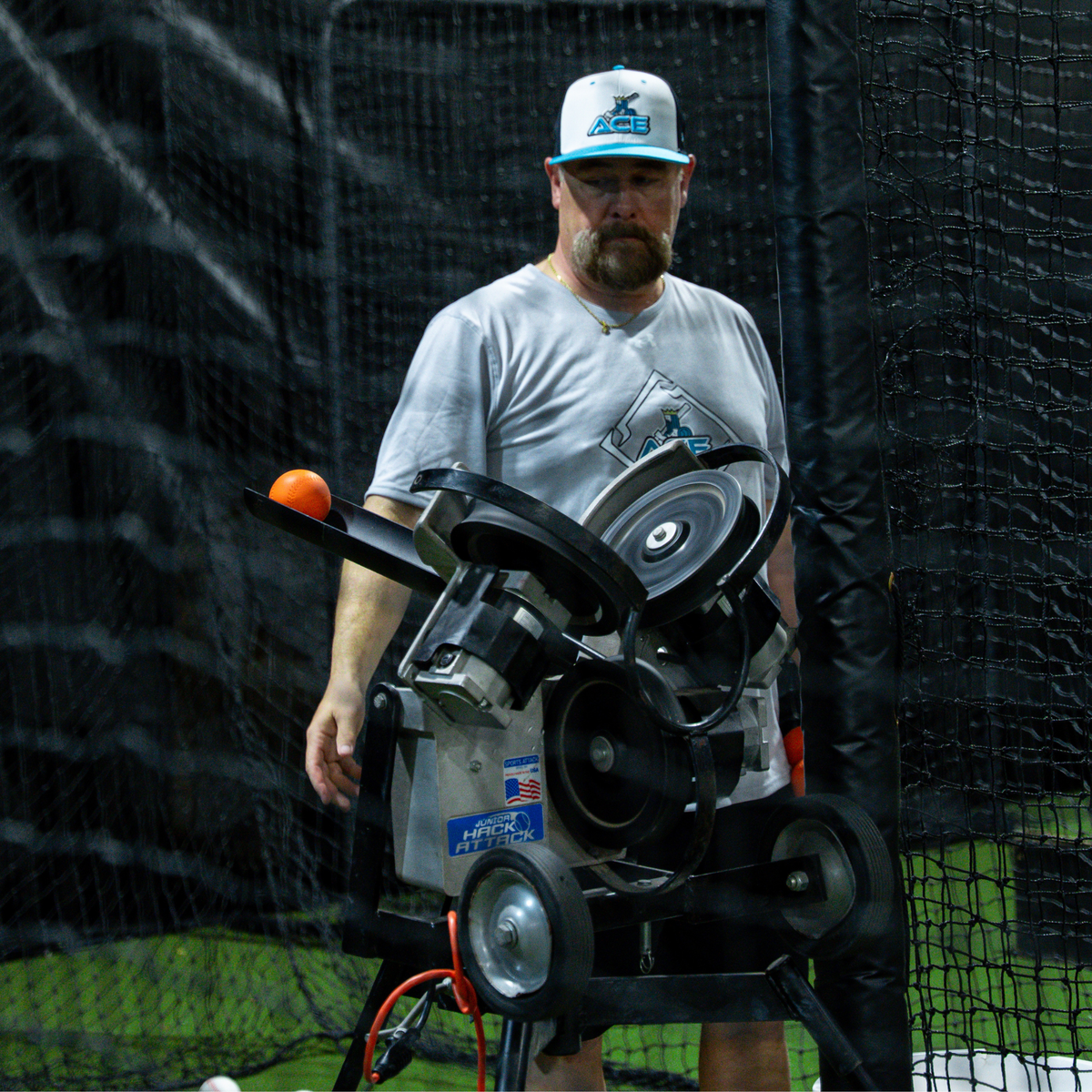 Extended baseball pitching machine chute source image 5