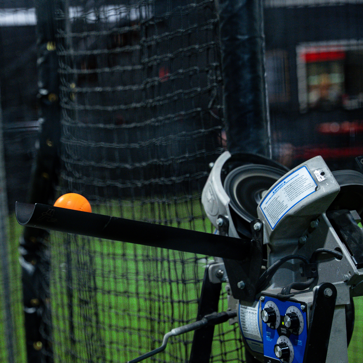 Extended baseball pitching machine chute source image 6